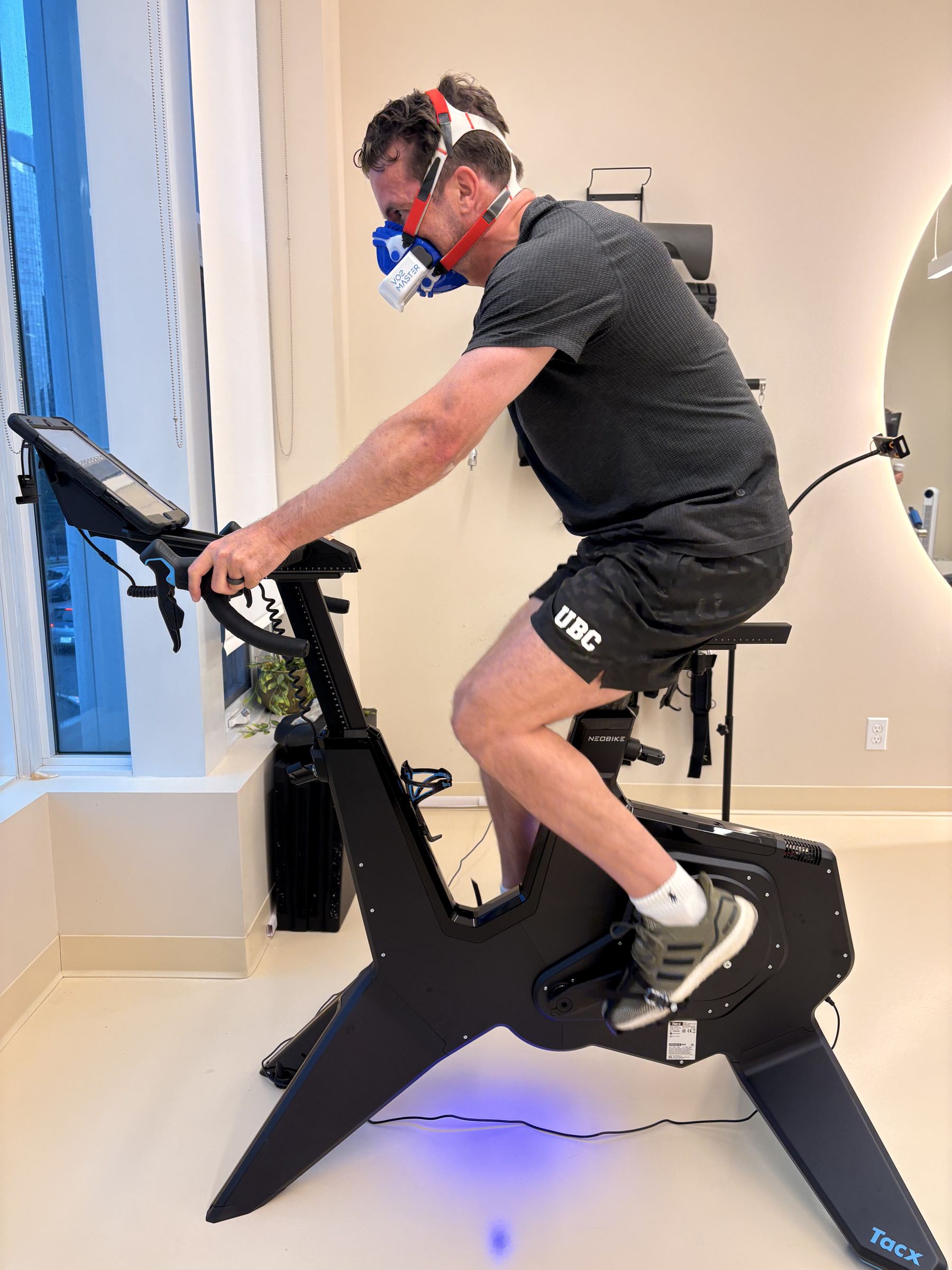 Man doing a VO2 max test on a bike at Aeon Future Health in Calgary