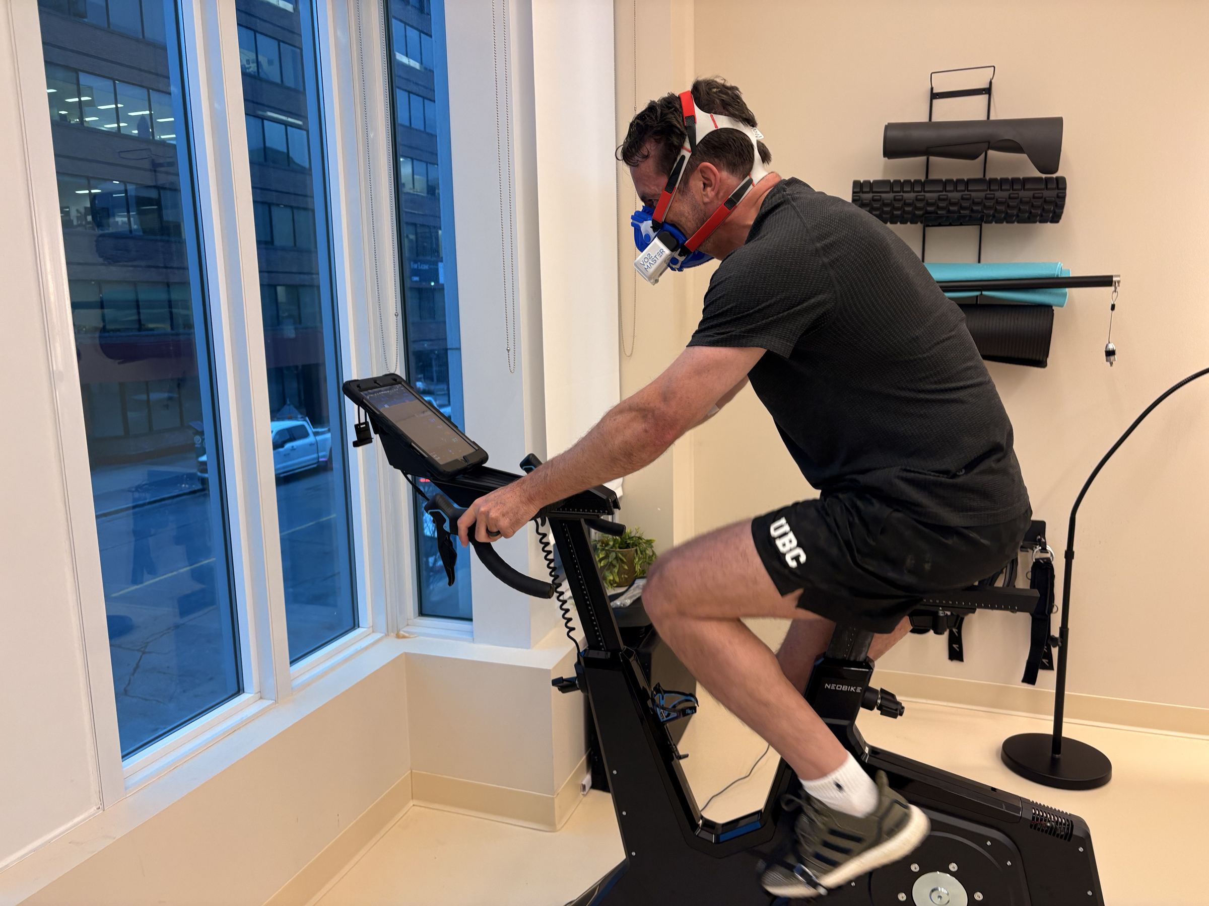 Man doing a VO2 max test on a bike at Aeon Future Health in Calgary
