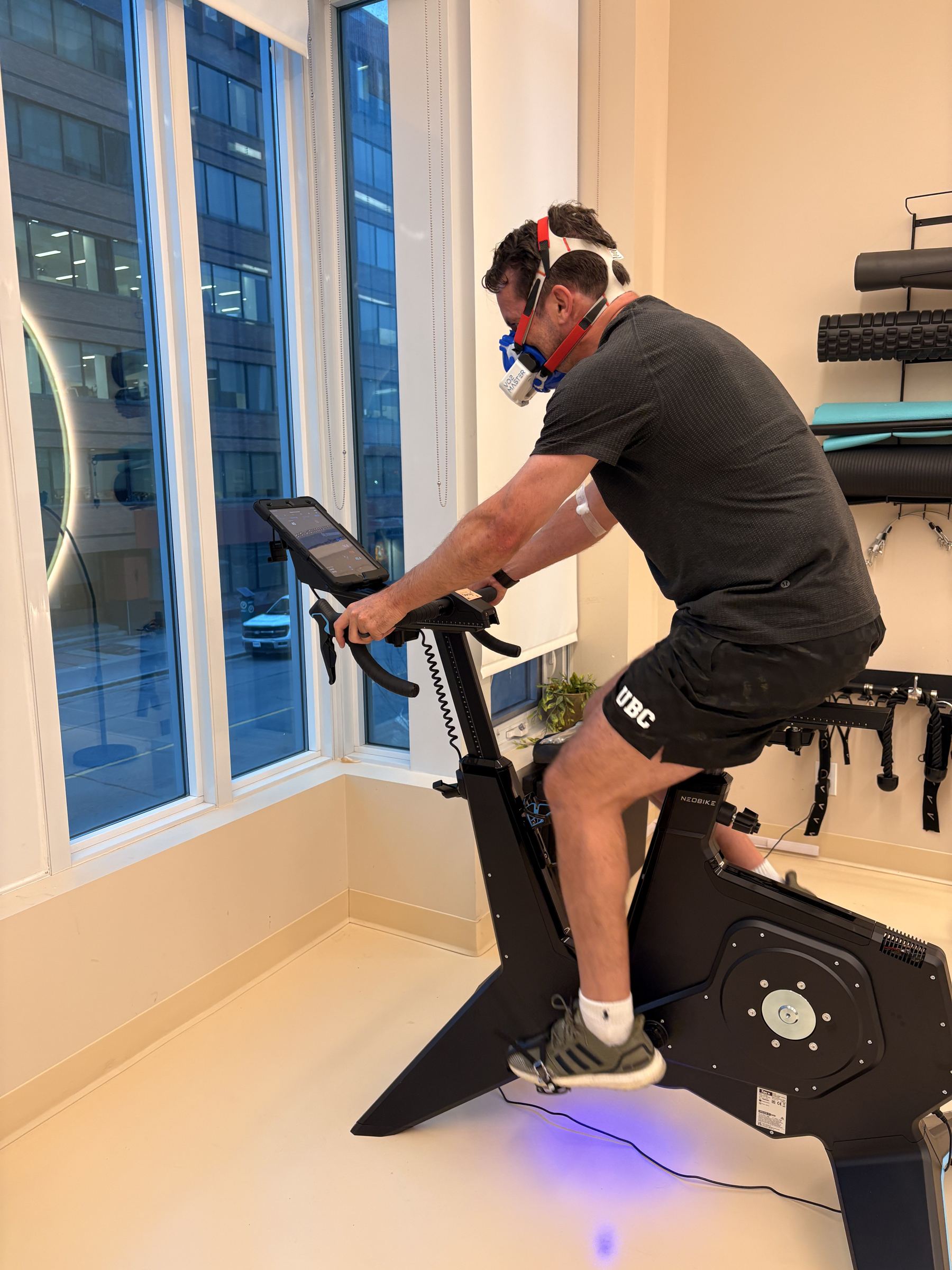 Man doing a VO2 max test on a bike at Aeon Future Health in Calgary